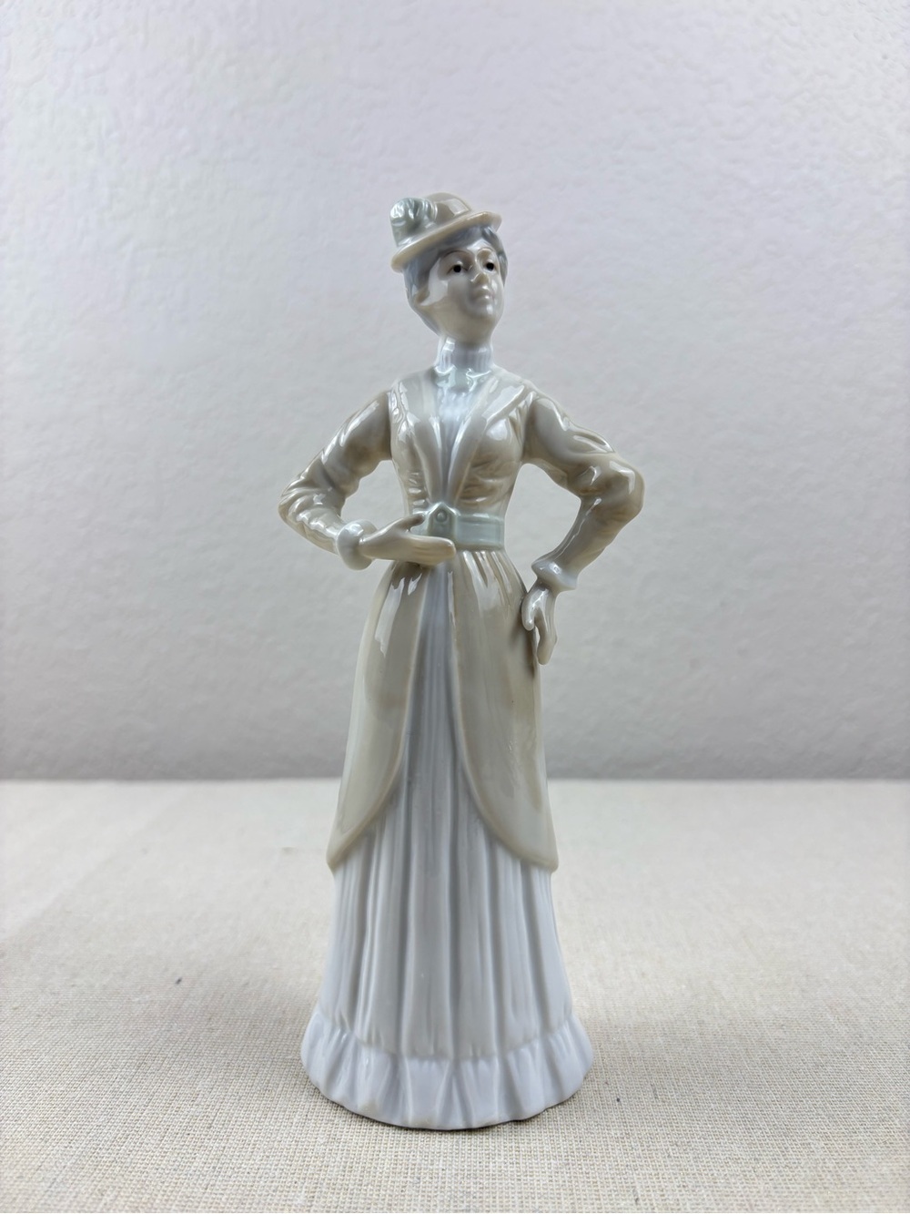 Vintage Victorian-Style Porcelain Figurine With a Lady in a Beige & White Dress